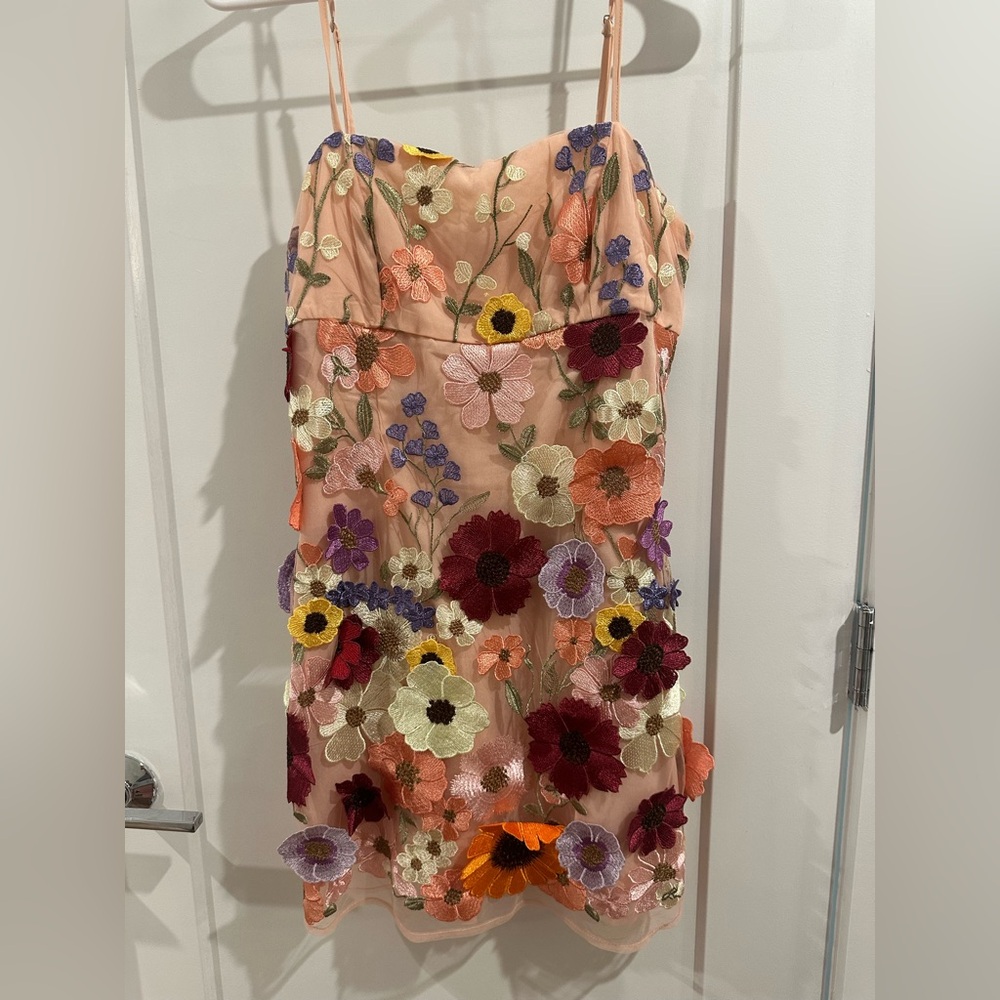 Nude fitted dress with gorgeous flower detail